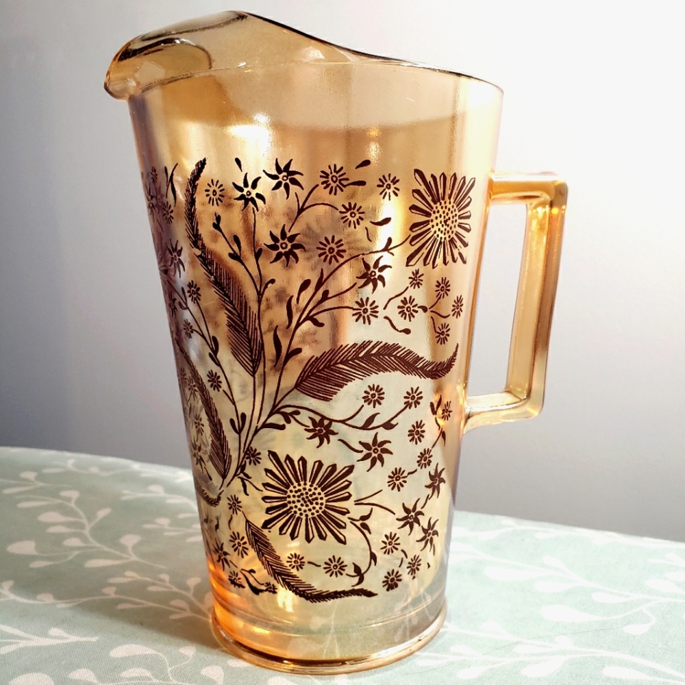1950's irredesent caramel glass pitcher.